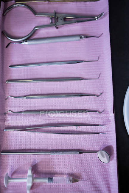 Dental tools arranged on tray — Stock Photo