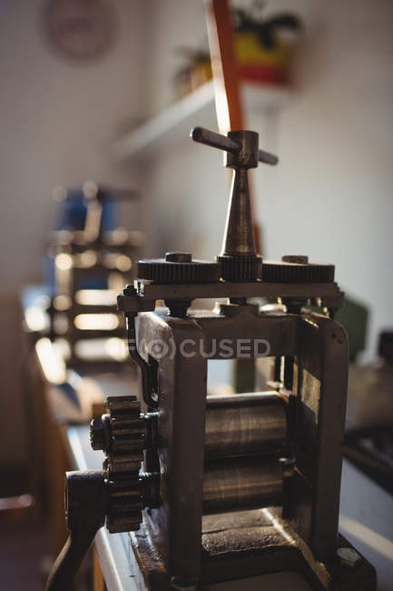 Close-up of hand rolling mill in workshop — Stock Photo