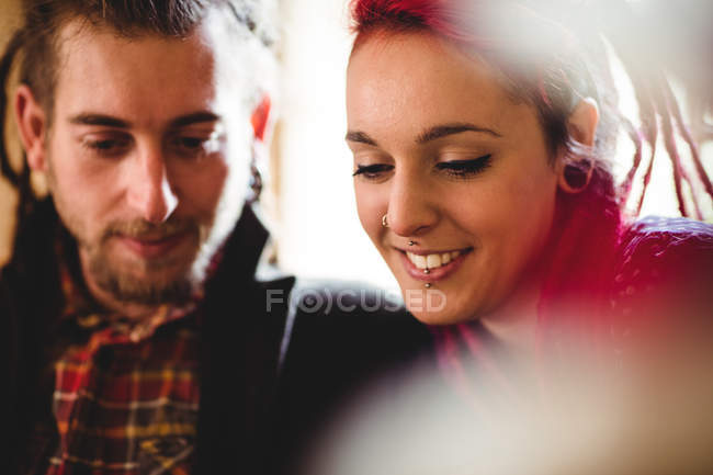 Close-up of happy hipster couple at home — Stock Photo