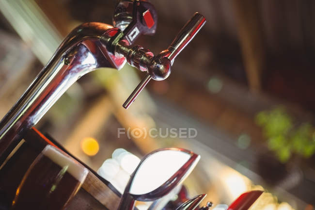 Close-up of beer pump in bar — Stock Photo
