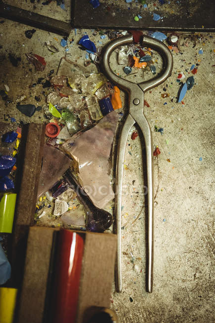 Close-up of glassblowing tools on table at glassblowing factory — Stock Photo