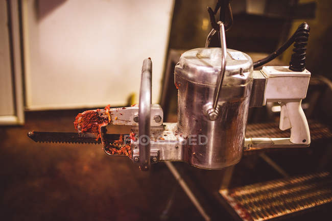 Meat cutter machine at butchers shop — Stock Photo