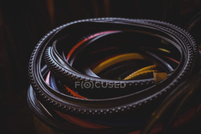 Close up of stack of tires in bicycle shop — Stock Photo
