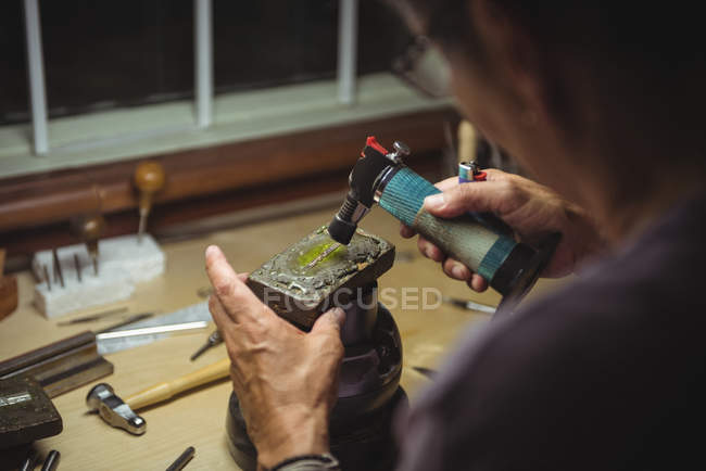 Close-up of craftswoman working in workshop — Stock Photo