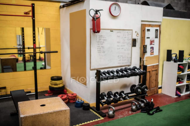 Various exercising equipment in fitness studio — Stock Photo