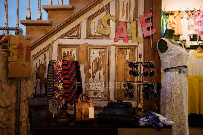 Various accessories on display at boutique store — Stock Photo
