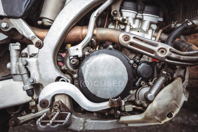 Close-up of motorbike engine in workshop — Stock Photo