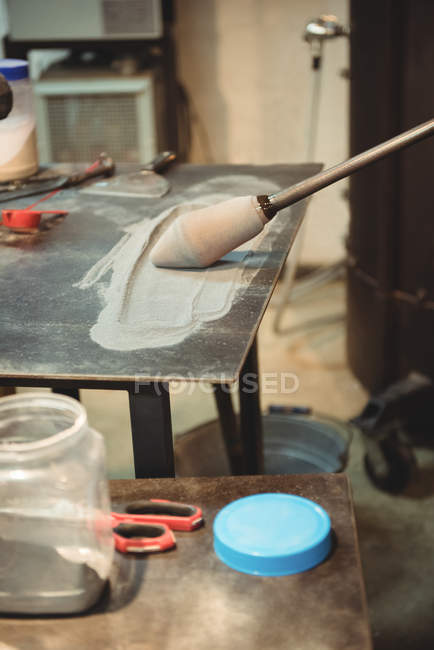 Molten glass on marver table at glassblowing factory — Stock Photo