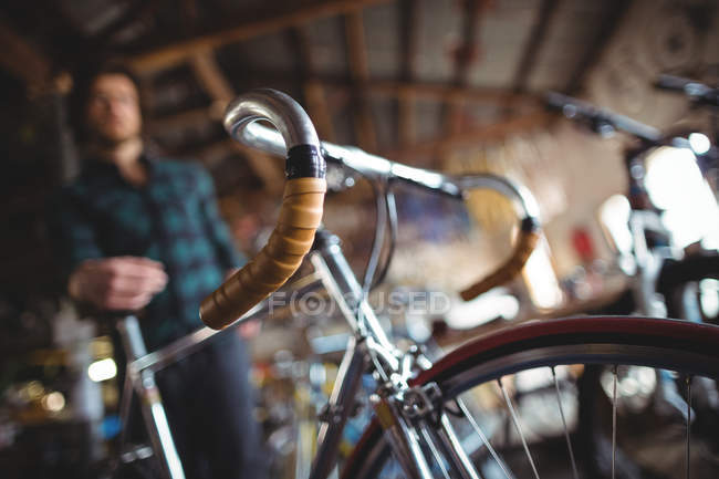 Close-up of bicycle in workshop — Stock Photo