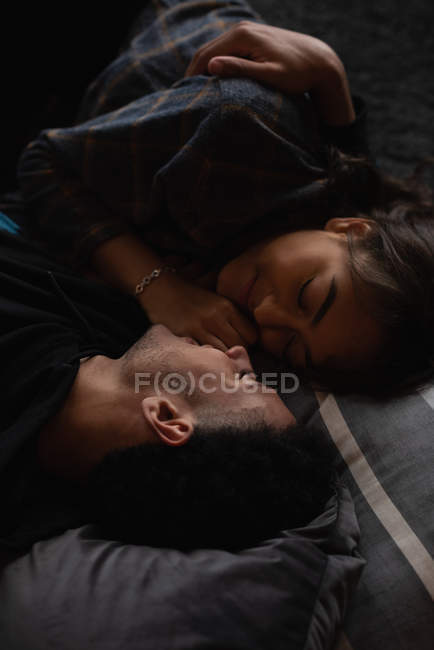 Close-up of couple relaxing on floor at home — Stock Photo