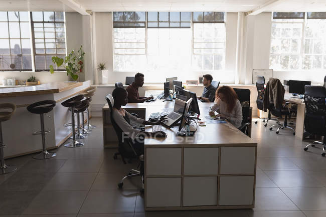 Attentive executives working in office — Stock Photo