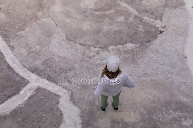 High angle view of woman standing at skateboard park — Stock Photo