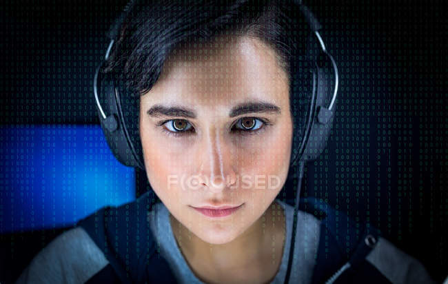 Close-up of executive looking at futuristic screen in office — Stock Photo