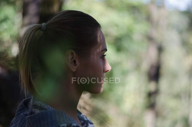 Close up of thoughtful female hiker looking away — Stock Photo