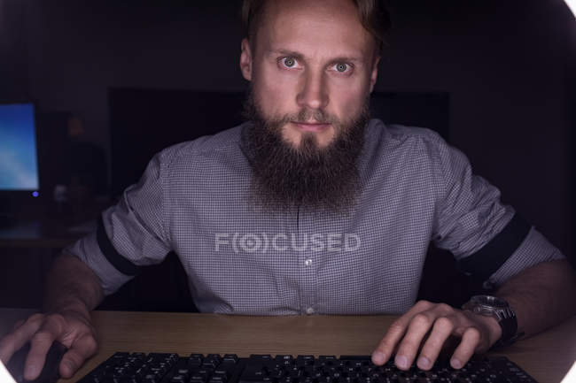 Executive working at desk in office — Stock Photo