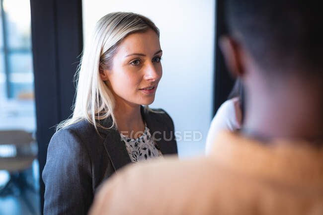 Diverse group of business colleagues discussing and having meeting. working in business at a modern office. — Stock Photo