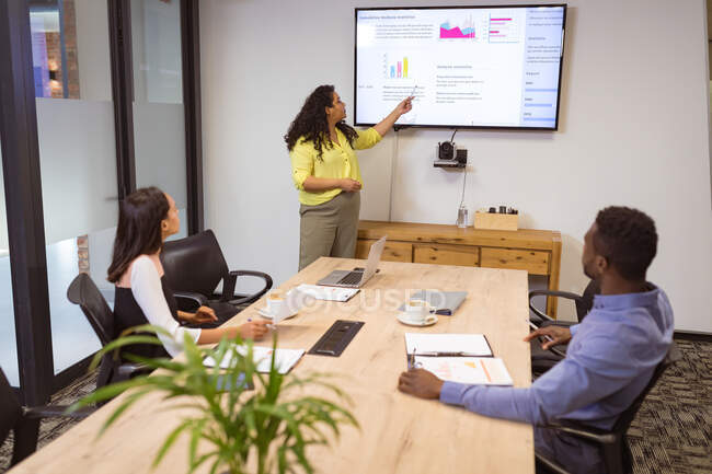 Focused diverse group of business people discussing work in modern office. business and office workplace. — Stock Photo