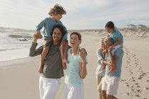 Family on the beach — Stock Photo