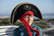 Little boy wearing pirate hat outdoors — Stock Photo