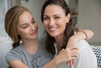Portrait of a happy woman with her daughter — Stock Photo