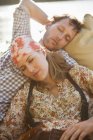 Relaxed young couple sleeping in boat — Stock Photo