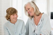 Woman and her grandson smiling — Stock Photo
