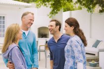 Two couples smiling together — Stock Photo