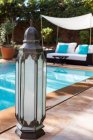 Lantern at poolside, Marrakesh, Morocco — Stock Photo