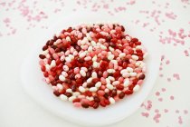 Close-up of colorful jellybeans in bowl — Stock Photo