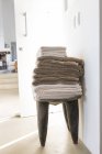 Stack of towels on chair, selective focus — Stock Photo