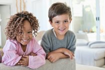 Portrait of a boy and girl smiling — Stock Photo