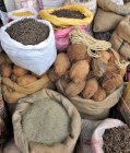 Bags of coconuts and seeds at Nawalgarh market — Stock Photo