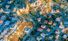 Turkey, Greme National Park and the rock sites of Cappadocia, aerial view of the city of Greme (UNESCO World Heritage) — Stock Photo