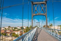 France, Charente Maritime, Tonnay-Charentes, suspension bridge (1842, historical building) on the Charente river, pedestrians and cyclists gateway — Stock Photo