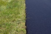 France, Asphalt pavement, close up — Stock Photo