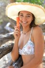 Young woman and sunscreen — Stock Photo