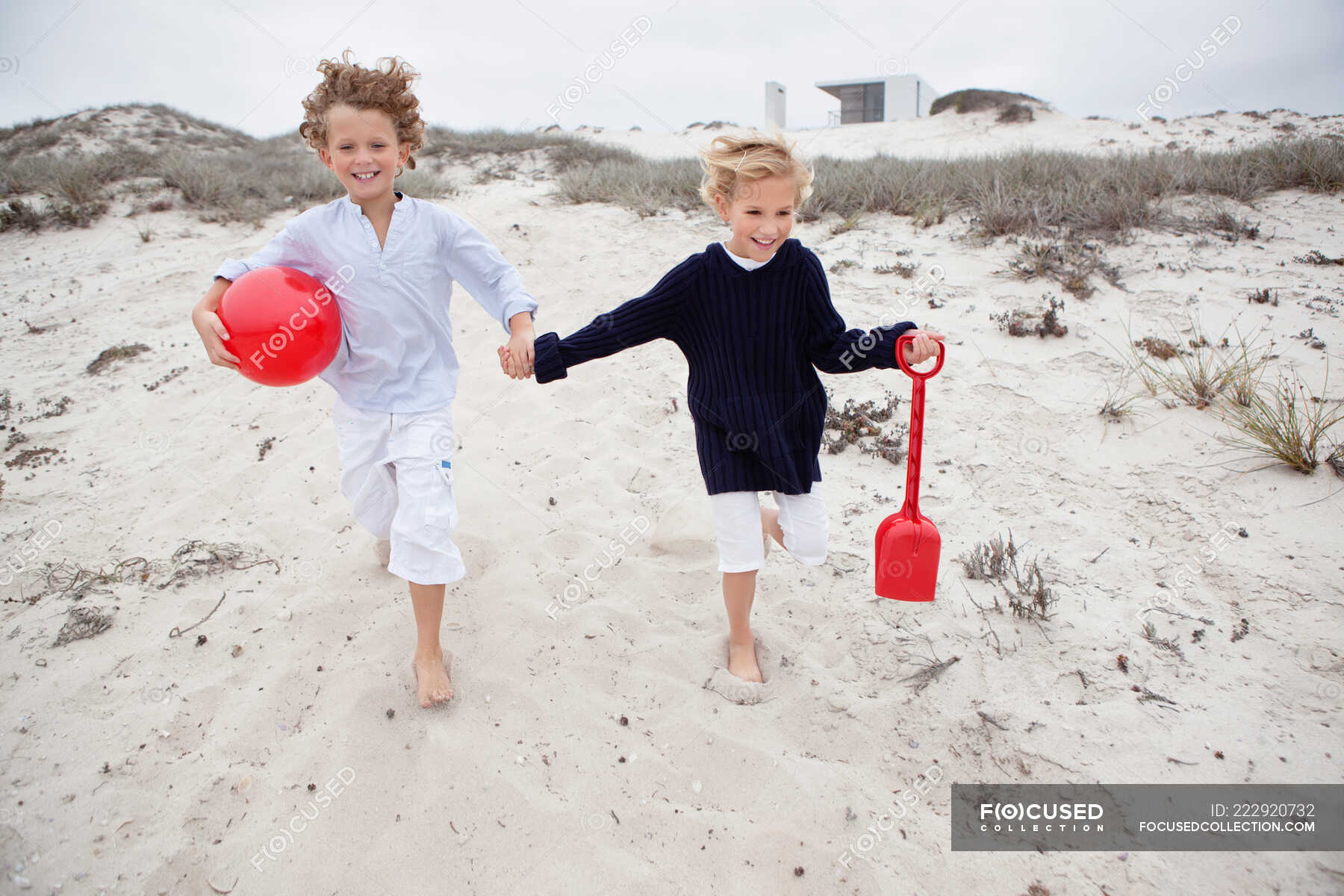 Children holding toys and running on sand — weekend, object - Stock ...