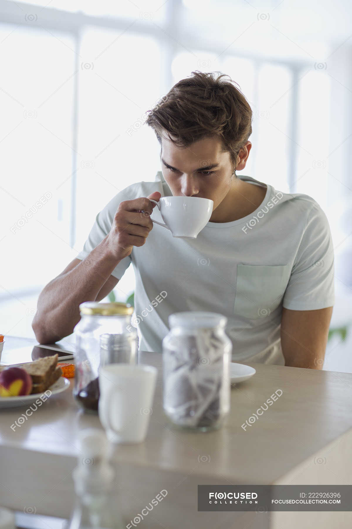 Close Up Of Young Man Drinking Coffee At Home — Caucasian Ethnicity Selective Focus Stock 