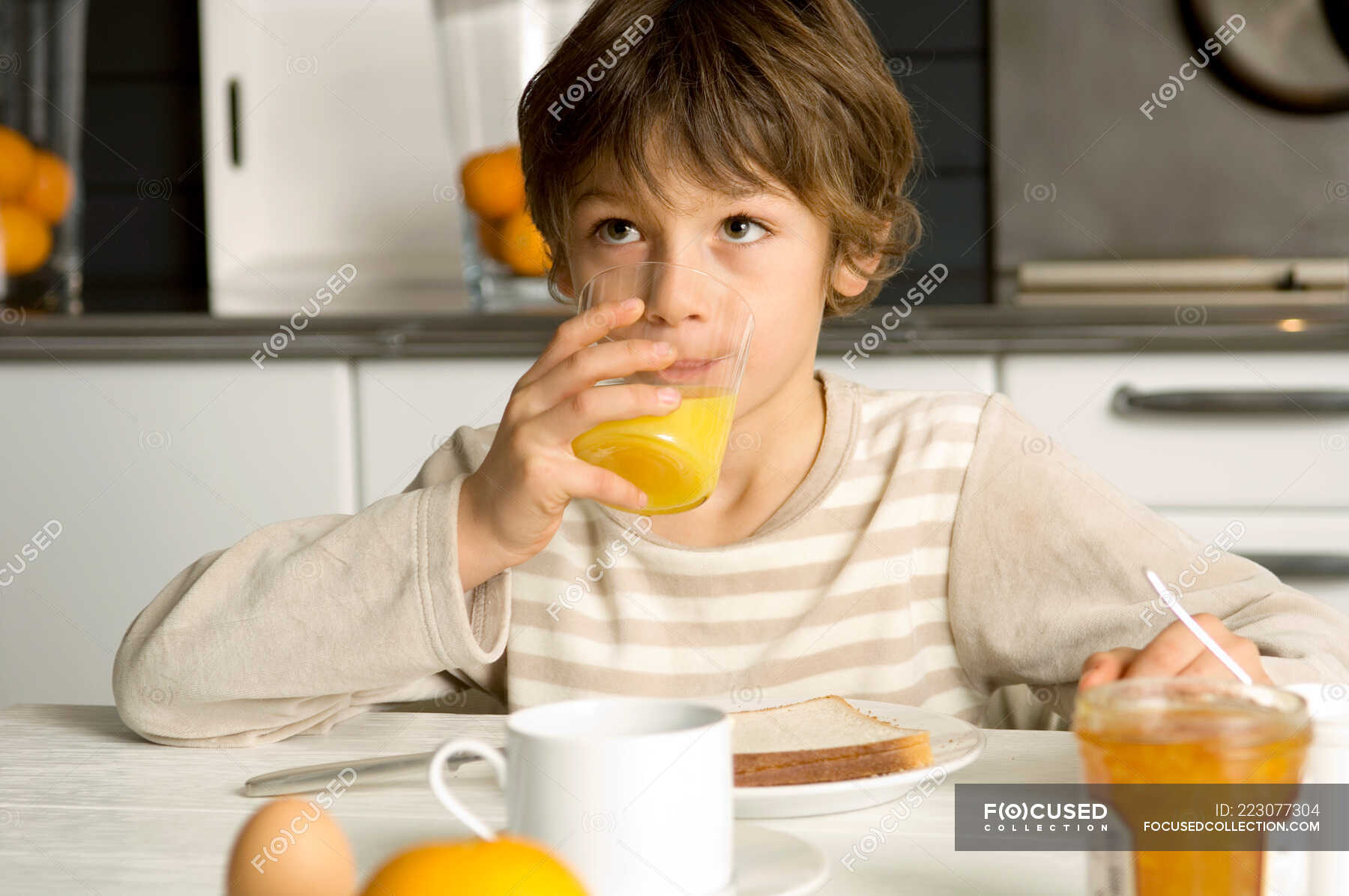Boy having breakfast at home — freshness, Kitchen Counter - Stock Photo ...