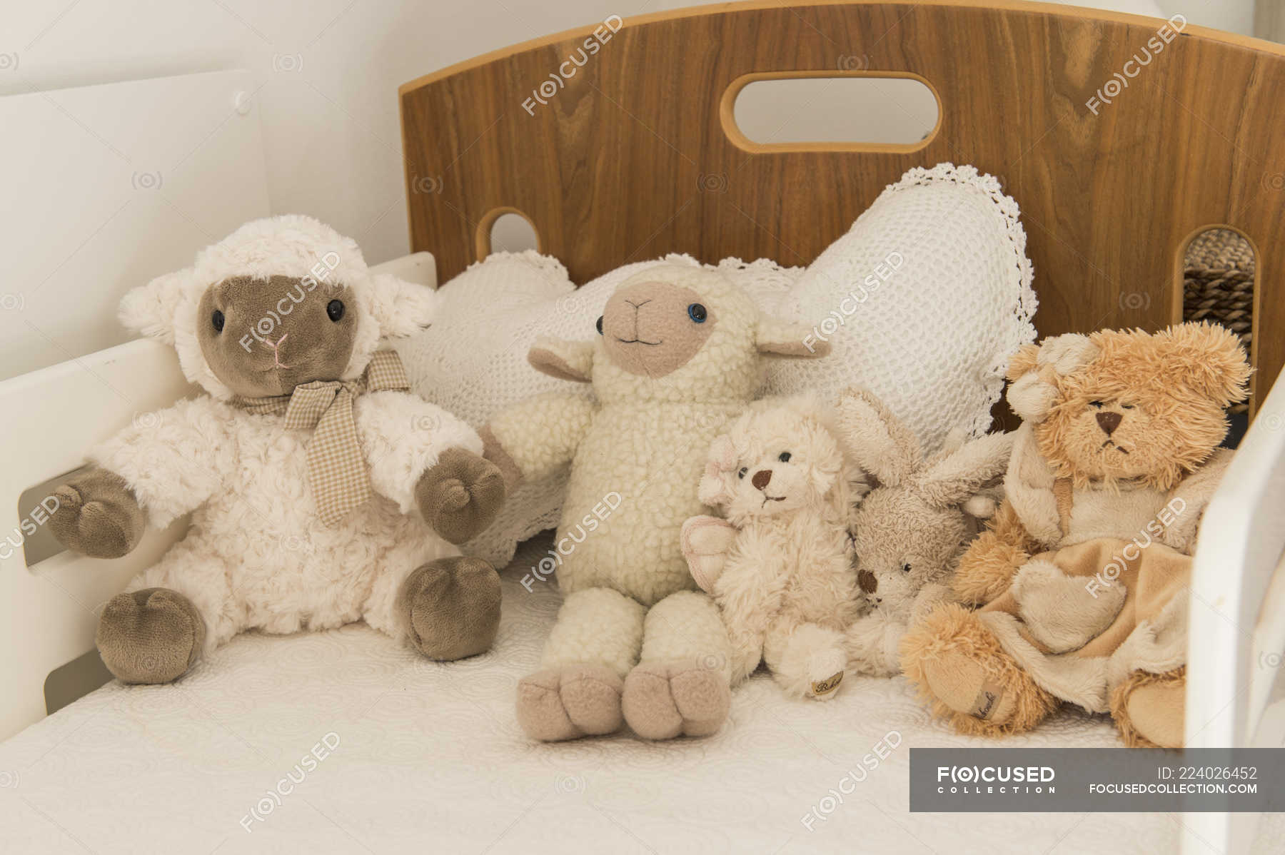 stuffed animals on a bed