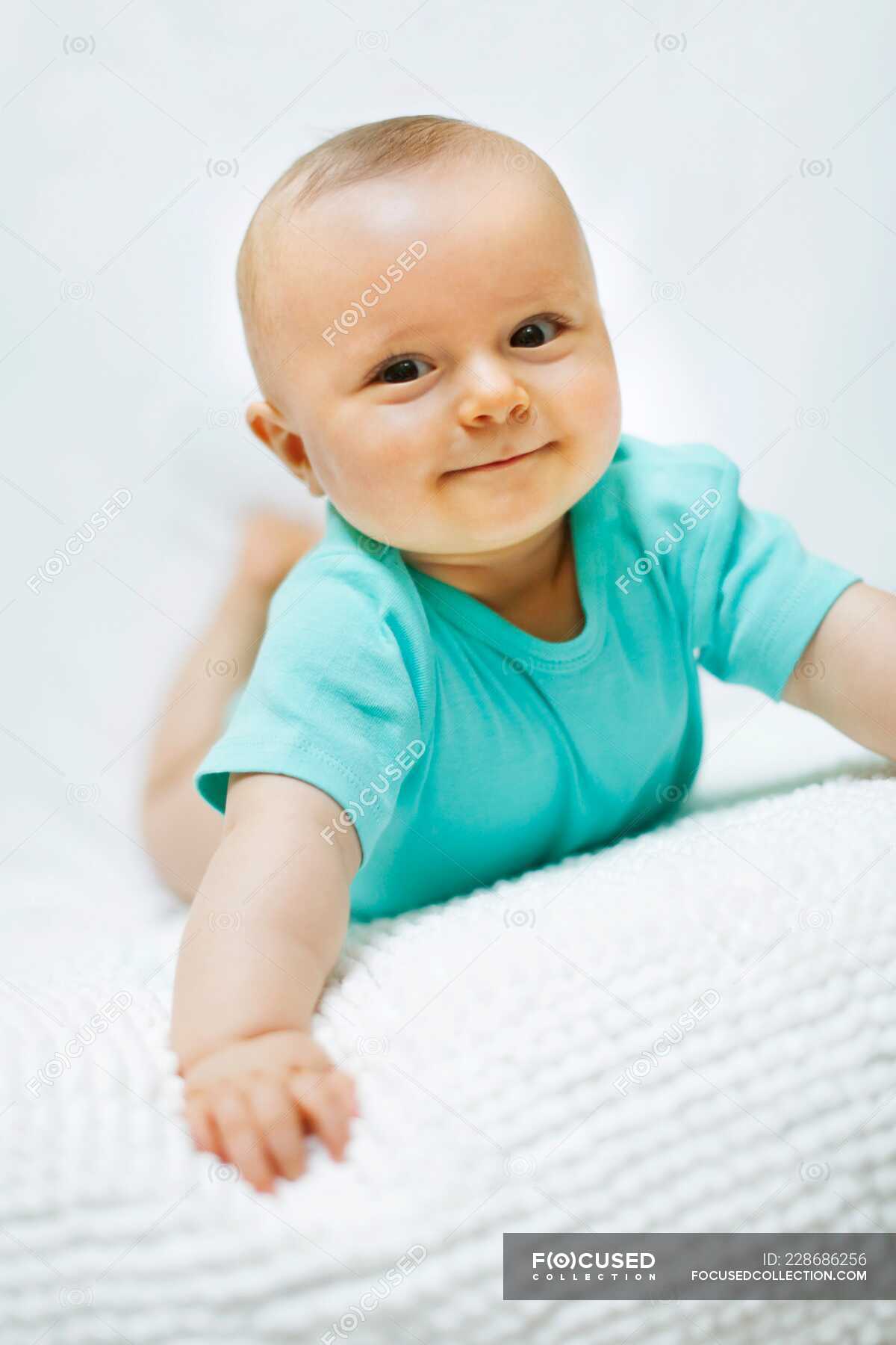 portrait-of-a-8-months-baby-boy-childhood-indoors-stock-photo