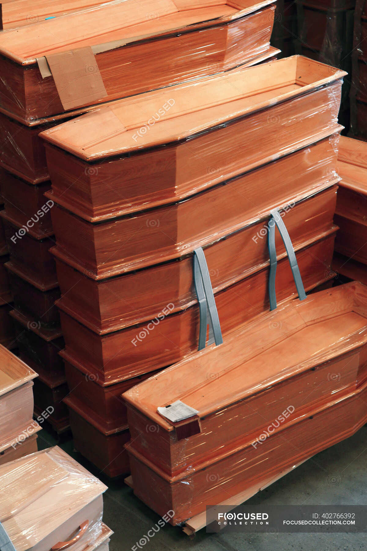 Wooden coffins in shop — purchase, undertaker - Stock Photo | #402766392