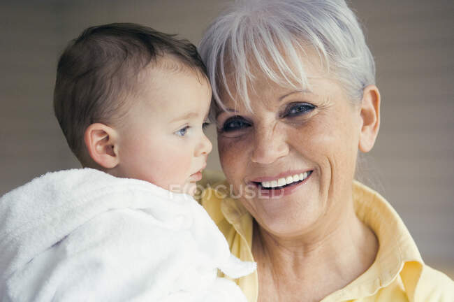 Portrait of grand mother and baby — Stock Photo