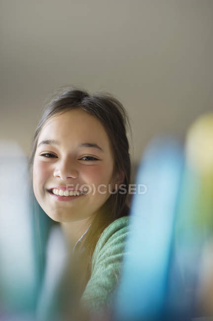 Portrait of happy teenage girl looking at camera — Stock Photo