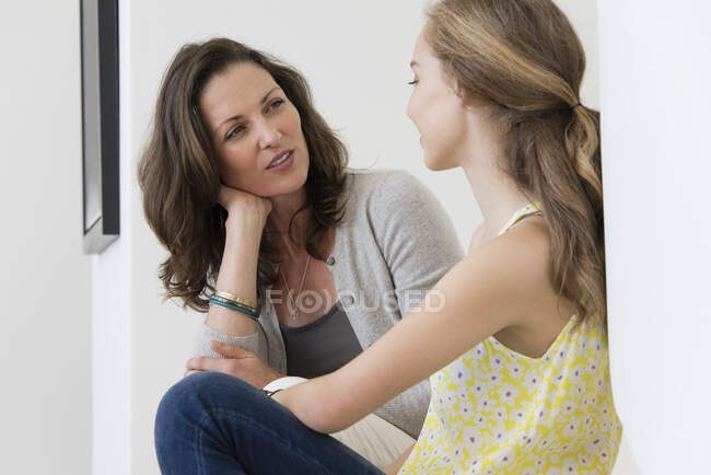Mature woman talking to her daughter — Stock Photo
