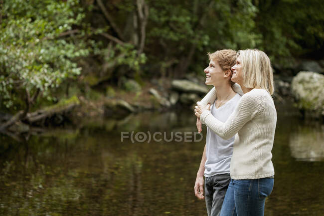 Mother and son enjoying in a park — Stock Photo