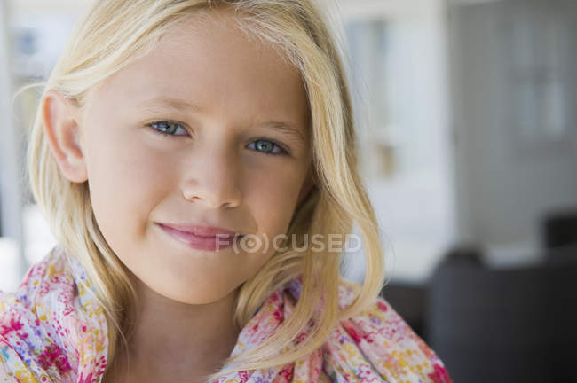 Close-up of blonde little girl smiling — Stock Photo