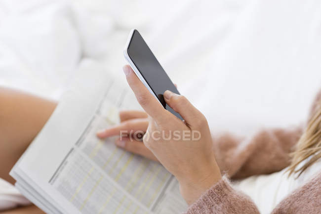 Close-up of woman using mobile phone — Stock Photo
