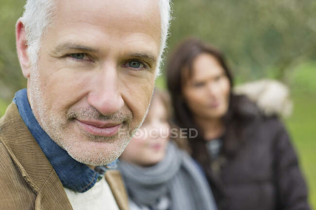 Portrait of a man with his family — Stock Photo