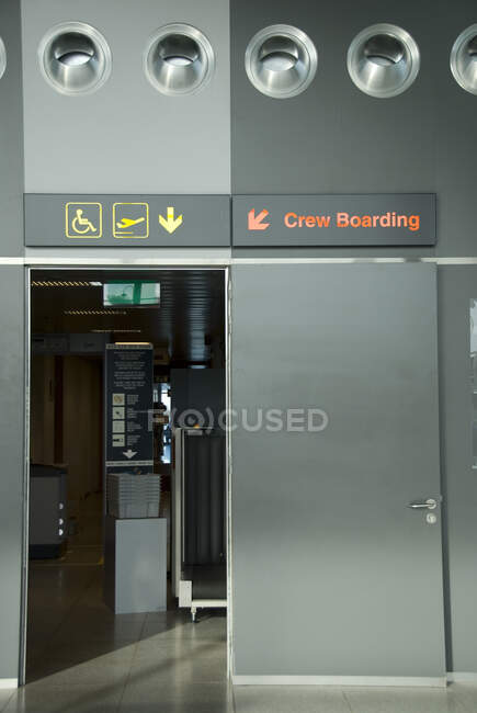 Airport signs inside building — Stock Photo